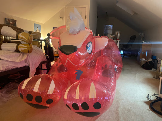 Inflatable world pink skunk